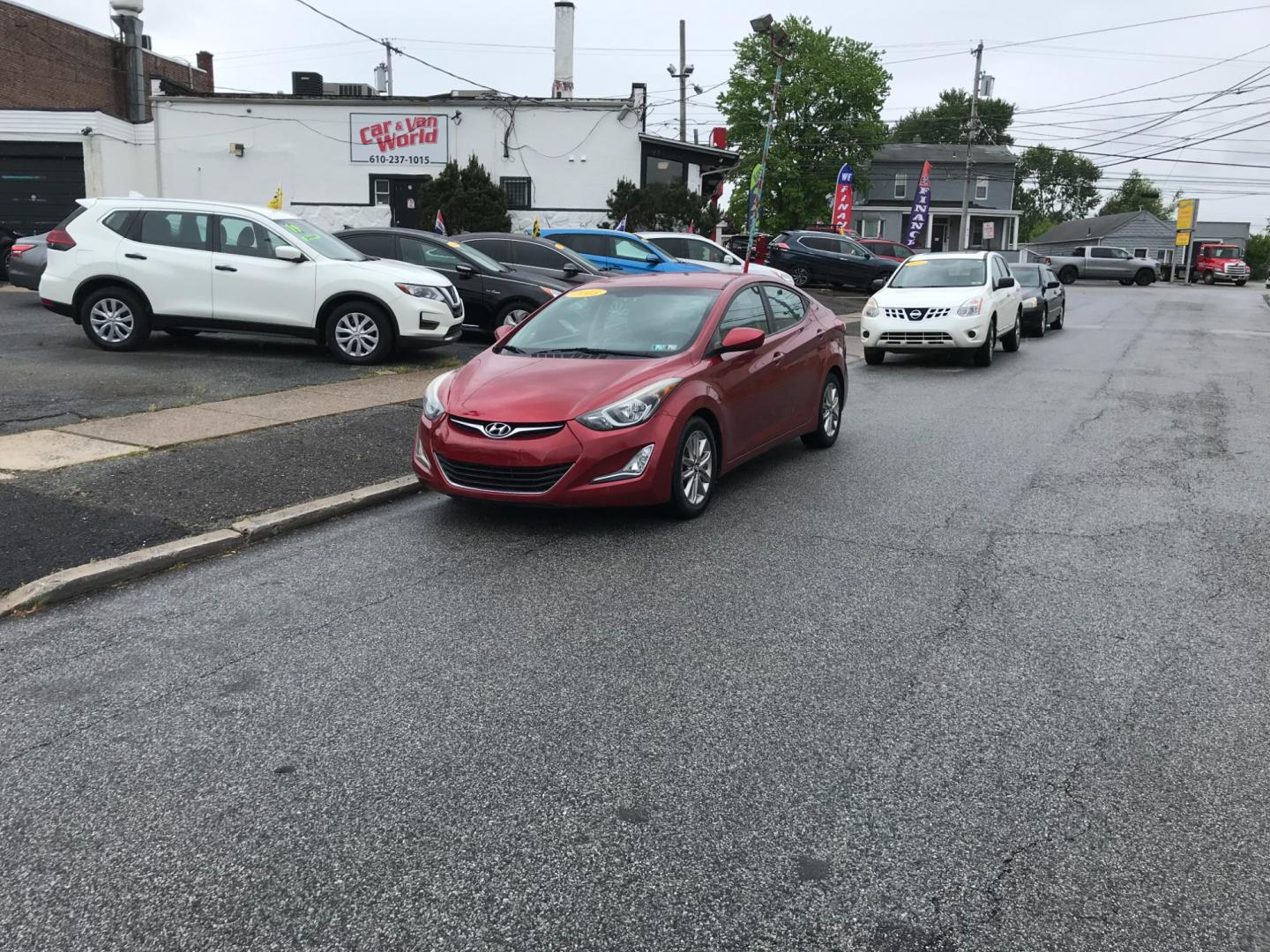 2015 Red /Gray Hyundai Elantra SE (5NPDH4AE7FH) with an 1.8 V4 engine, Automatic transmission, located at 577 Chester Pike, Prospect Park, PA, 19076, (610) 237-1015, 39.886154, -75.302338 - Photo#1